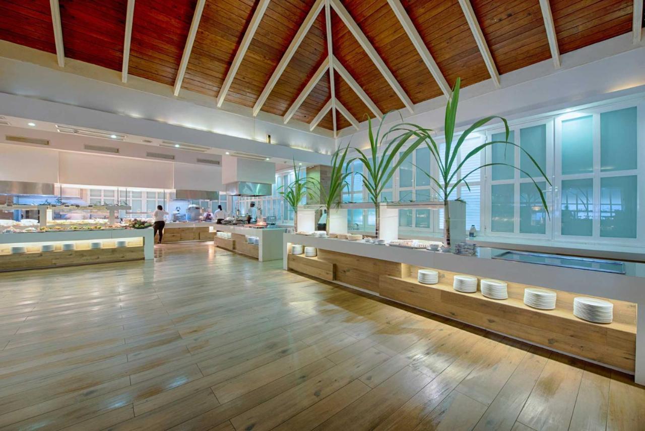 Grand Sirenis Punta Cana Resort & Aquagames Uvero Alto Exterior photo The interior of the airport's main terminal