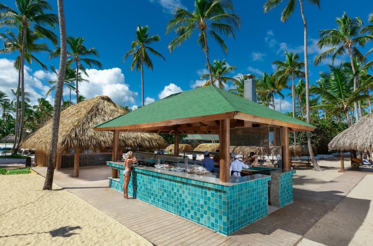 Grand Sirenis Punta Cana Resort & Aquagames Uvero Alto Exterior photo A beach bar in Punta Cana, Dominican Republic